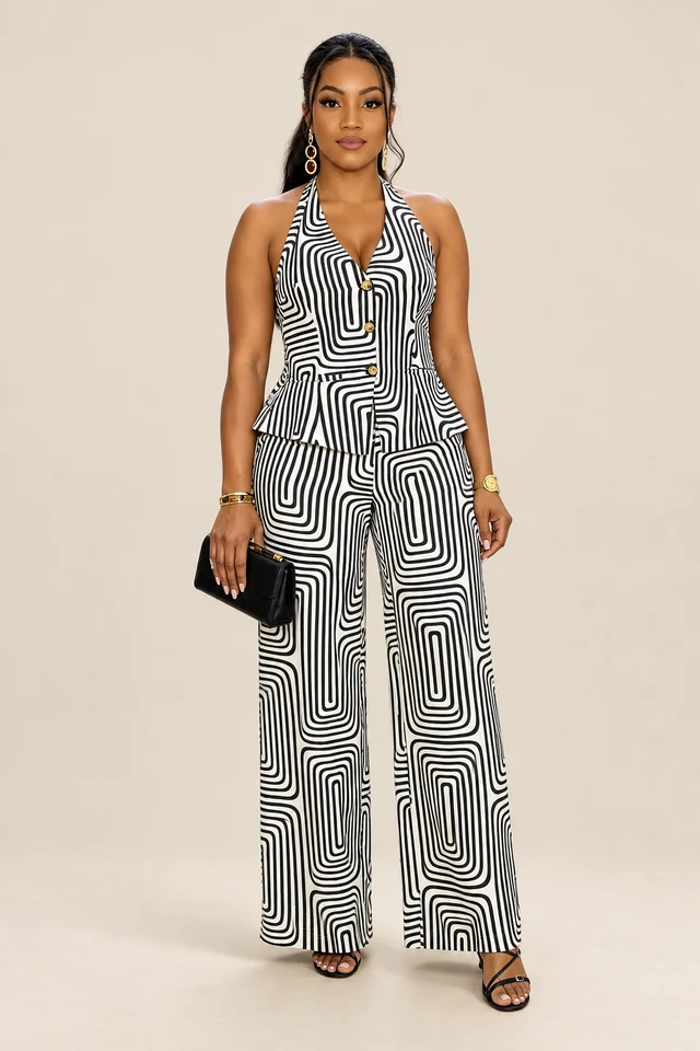 Black and white geometric halter top with matching trousers.