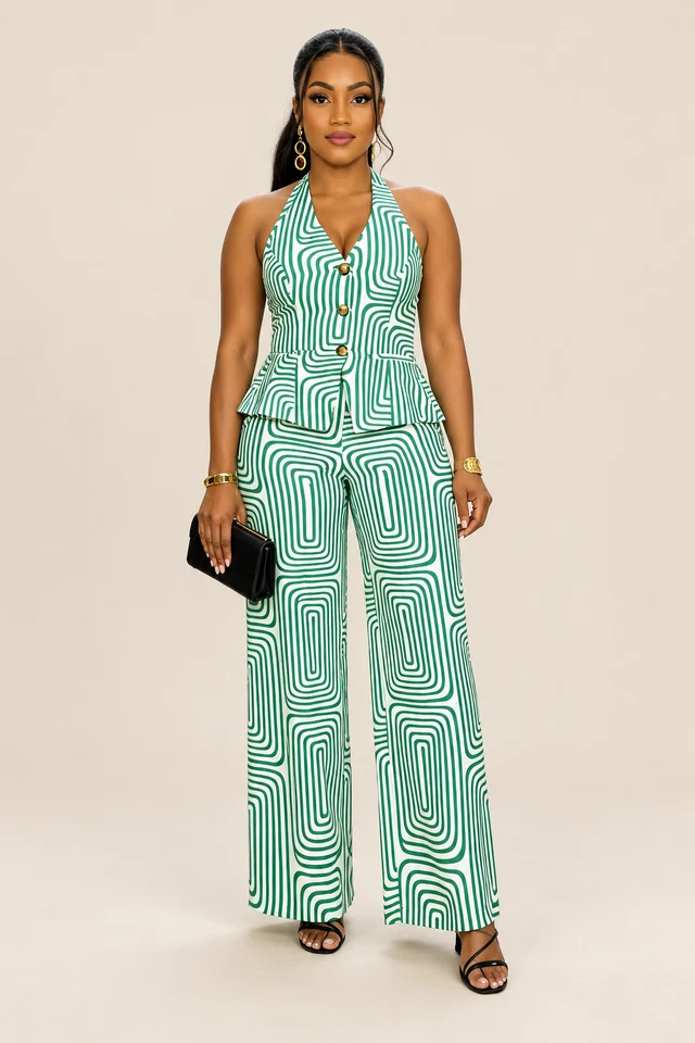 Green and white geometric halter top with matching trousers.