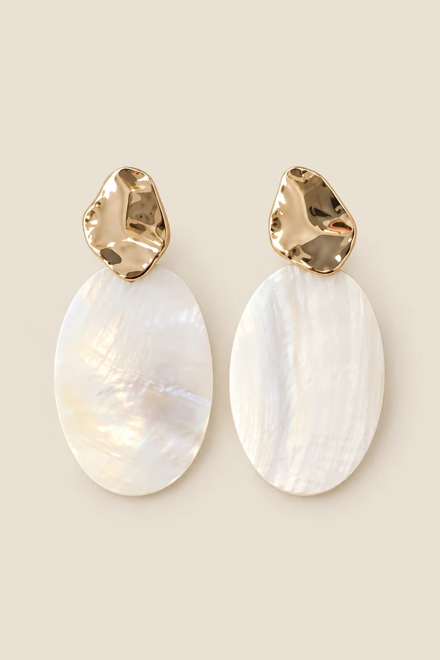 Ivory oval drop earrings.