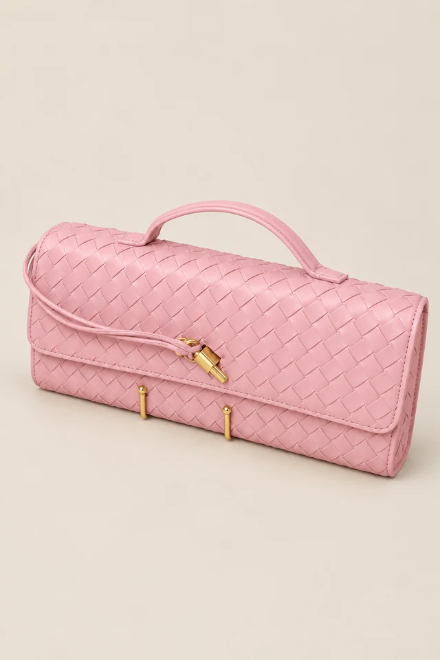 Pink woven handle bag.