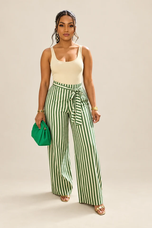 Stripe trousers & cream top.