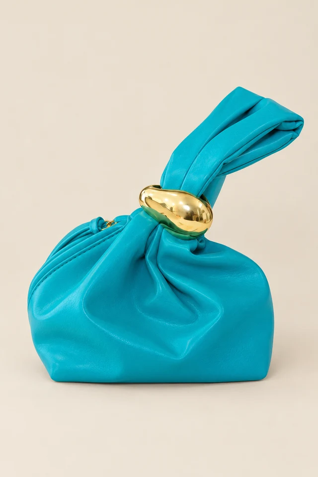 Turquoise knotted bag.