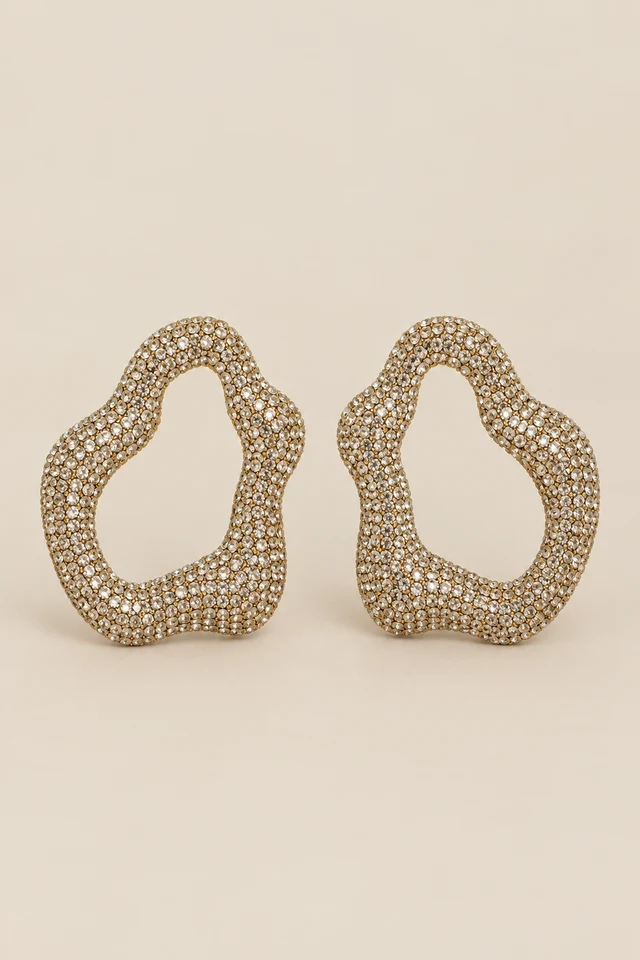 Open-heart-shaped sparkling statement earrings.